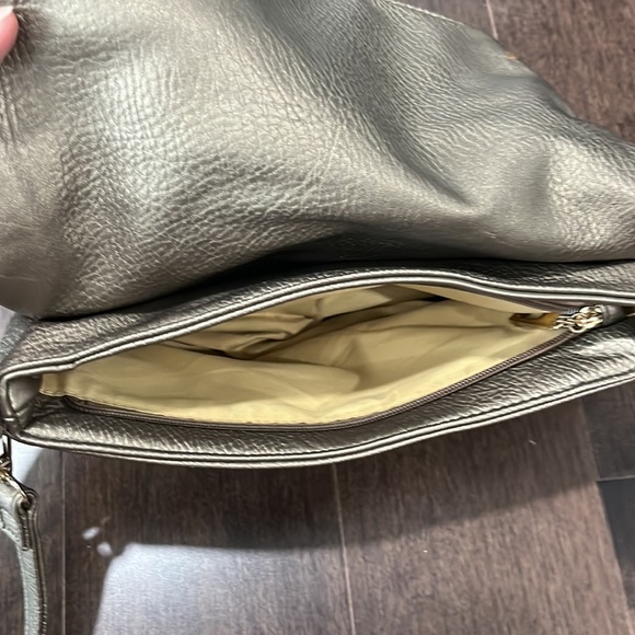 Womens bronze gold adjustable strap handbag with flap closure. - Picture 8 of 12